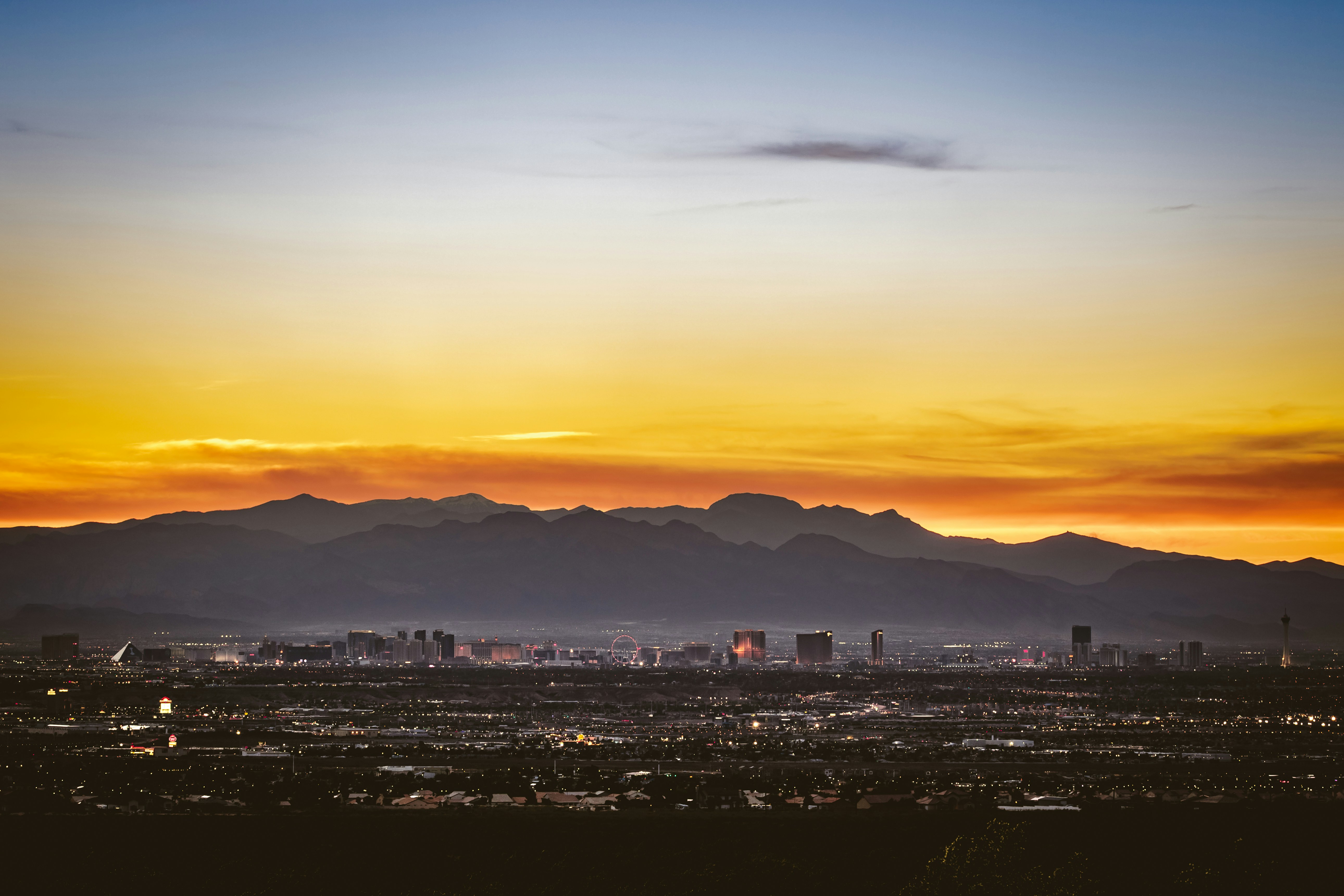 The Las Vegas Strip at sunset, with the Spring Mountains beyond